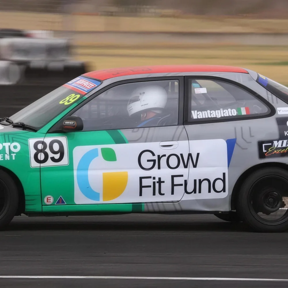 Ivan Vantagiato at speed in car 89 on circuit